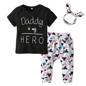 Her daddy is her hero.  This graphic t-shirt, pants with a stylish headband is a cute outfit.  PRODUCT DETAILS,  Headband Pullover graphic t-shirt, Full-elastic waistband on the pants provides a comfortable and secure fit, Banded cuffs, 100% Cotton, Machine Washable